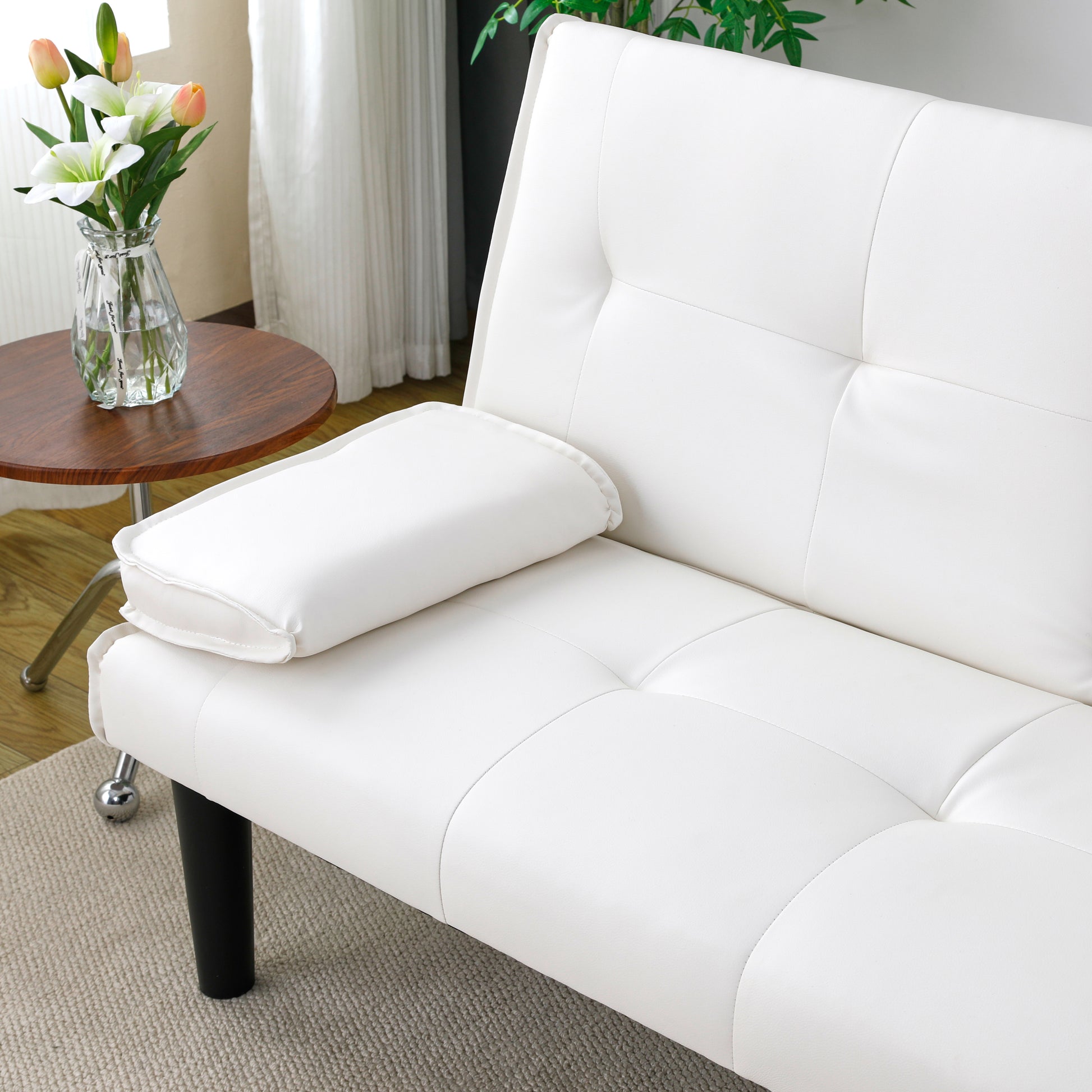 The 67-inch white PVC multi-functional sofa bed, with a foldable and cup holder design, makes it extremely convenient to turn the living room into a guest room image 6