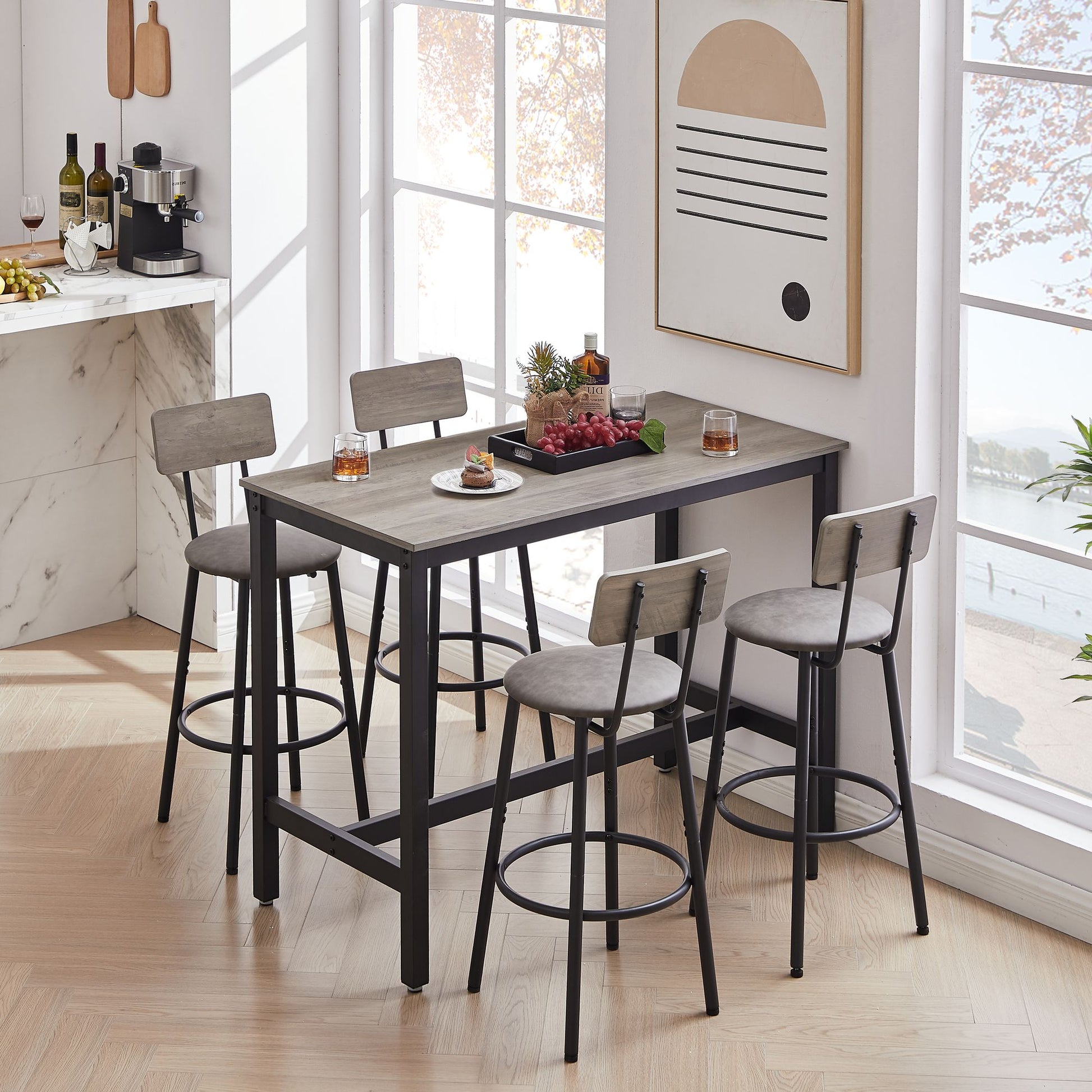 Bar table set with stools pulled out, side view