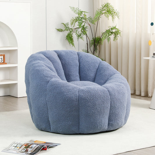 Bean bag chair with armrests in living room setting