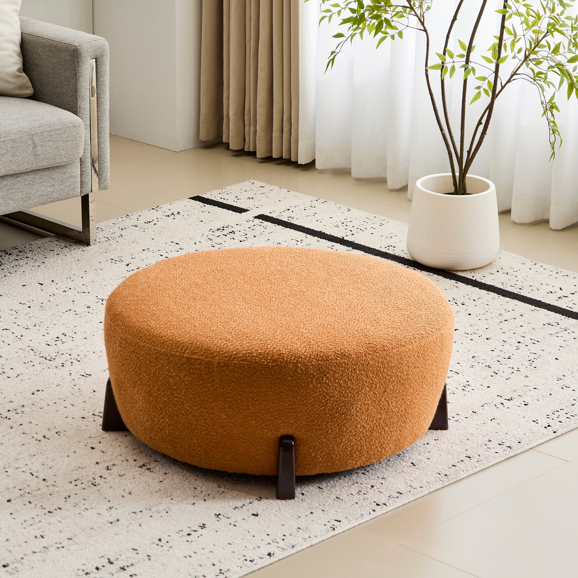 Modish Round Ottoman: Boucle Top with Splayed Rubber Wood Legs, Pumpkin Orange image 9