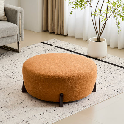 Modish Round Ottoman: Boucle Top with Splayed Rubber Wood Legs, Pumpkin Orange image 9
