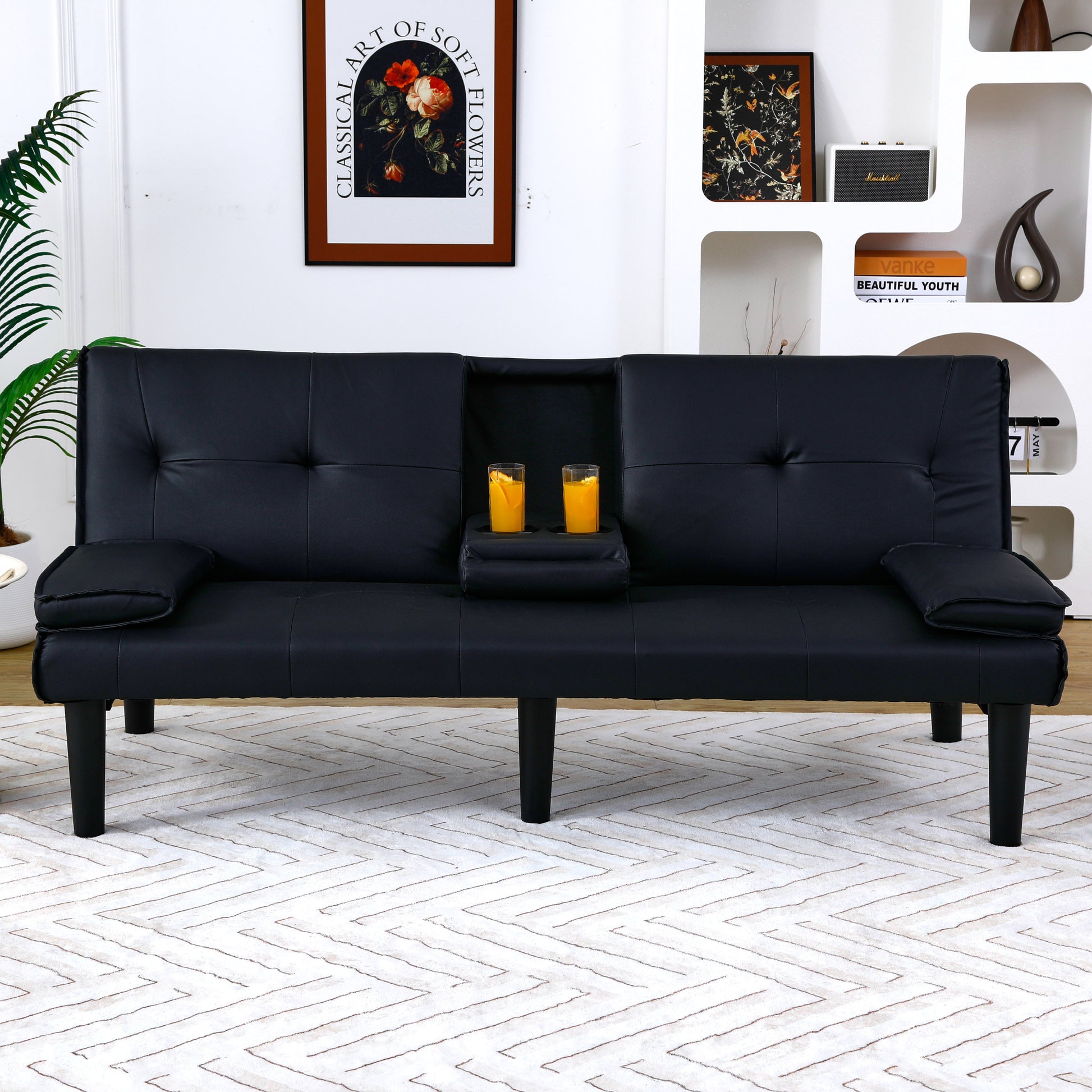 The 67-inch black PVC multi-functional sofa bed with a foldable and cup holder design makes it extremely convenient to turn the living room into a guest room image 6