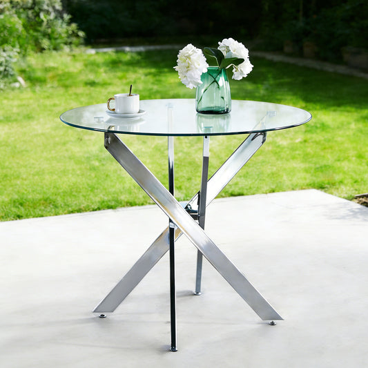 Modern glass dining table with chrome cross metal legs - front view