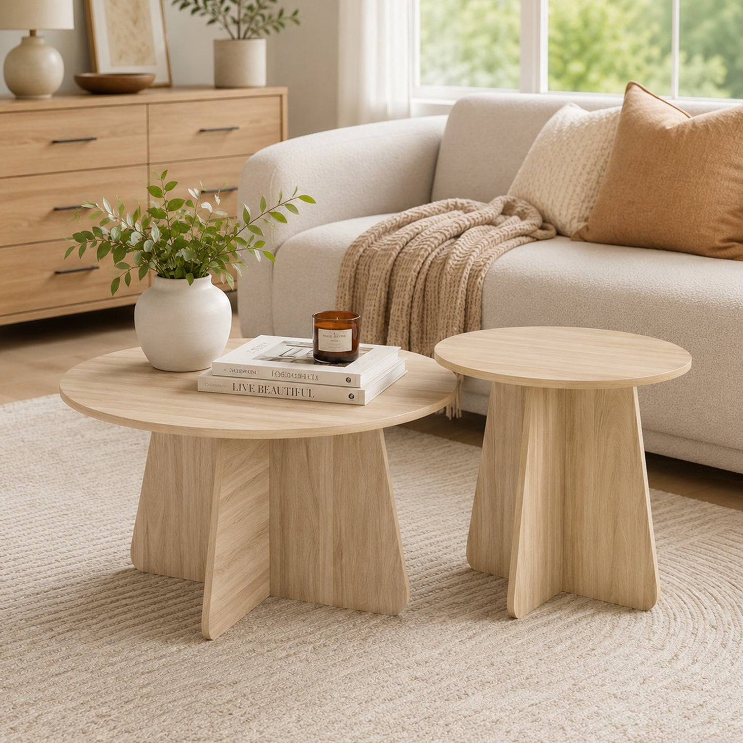 Retro-style nesting coffee table set. Available in walnut or natural wood finishes. Round nesting side tables with crisscross legs. Ideal for living rooms and dining rooms. image 1