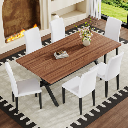 Table and chair set. 71 * 35.4 inch walnut MDF splicing desktop with X-shaped metal frame dining table.Includes 6 white PU dining chairs With Black Metal Legs.Making it an ideal choice for home. image 2