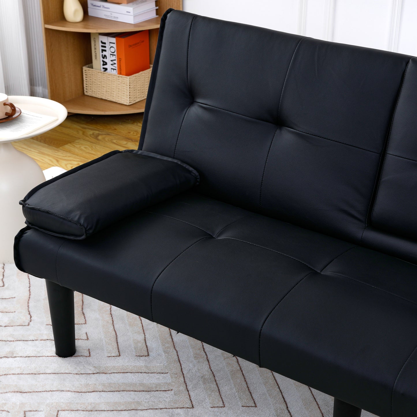 The 67-inch black PVC multi-functional sofa bed with a foldable and cup holder design makes it extremely convenient to turn the living room into a guest room image 5
