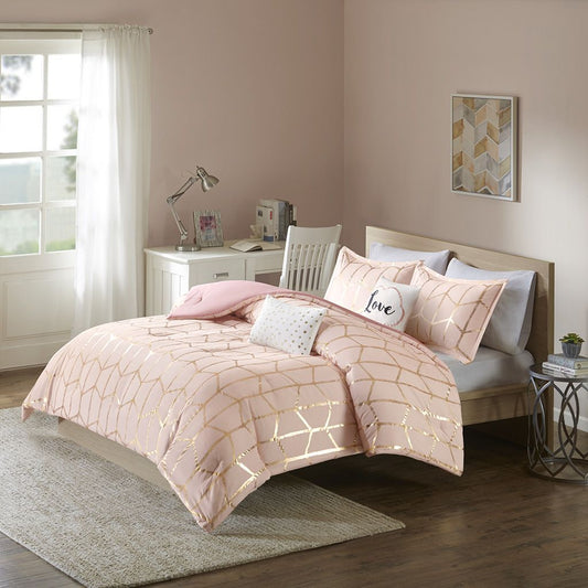 Full/Queen Metallic Printed Comforter Set on bed with blush and gold geometric pattern