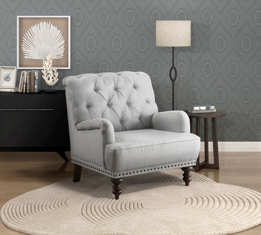 Gray and white tufted accent chair with nailhead trim - front view