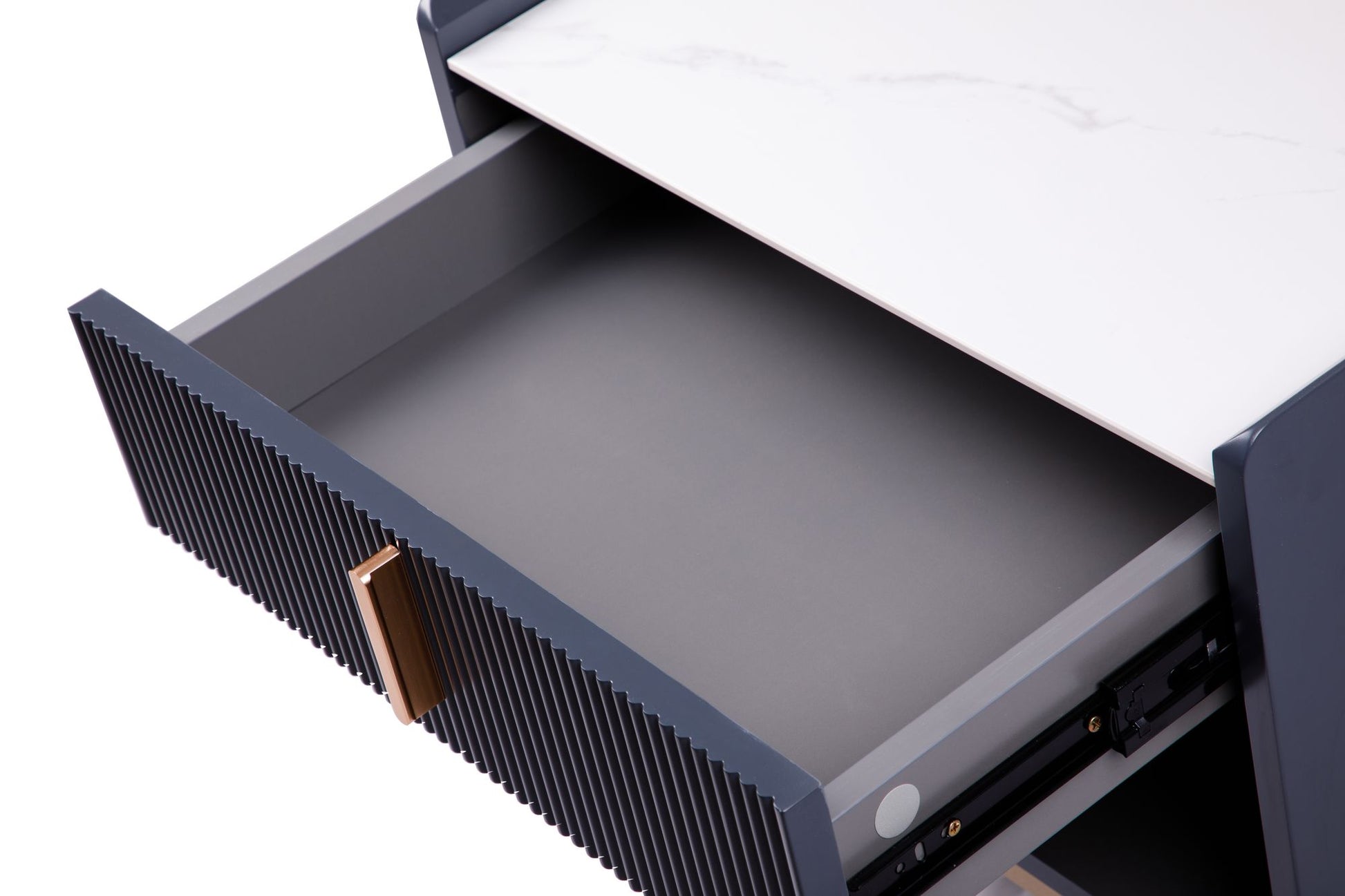 Close-up of white sintered stone tabletop on gold metal legs