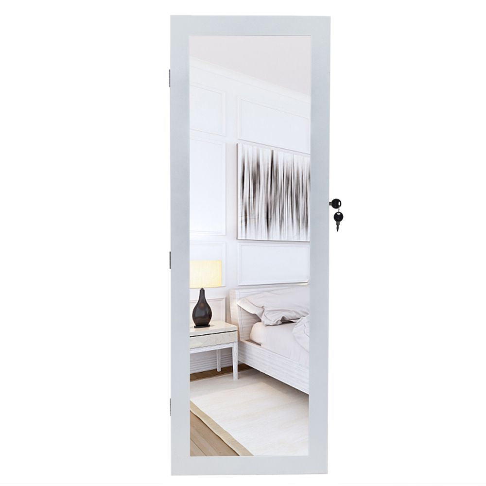 White jewelry cabinet with mirror open showing storage compartments