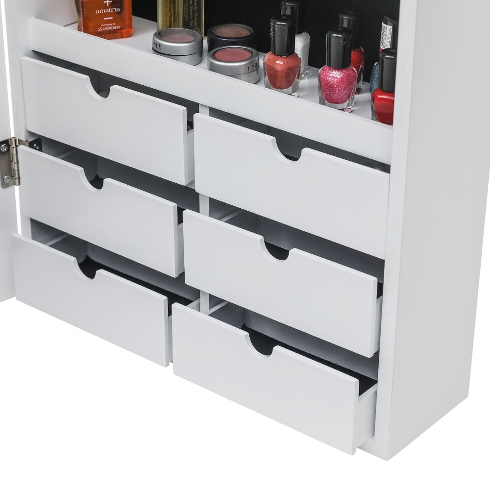 White jewelry cabinet mounted on wall
