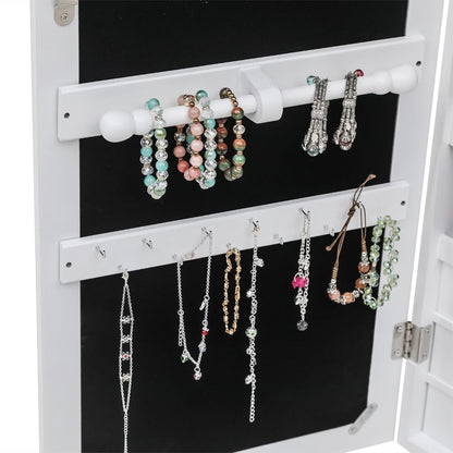 Interior of jewelry cabinet with ring grooves and hooks