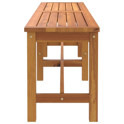 Outdoor wooden bench placed in garden setting