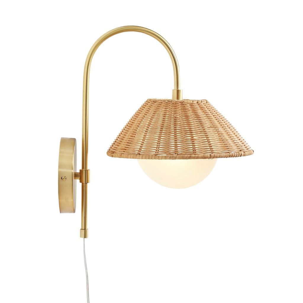 Rattan Weave Wall Sconce with light on ambient glow