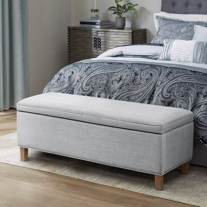 Rectangular Soft Close Storage Bench in light grey fabric with solid wood legs - front view