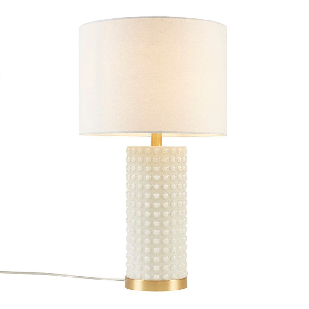 Textured Dot Table Lamp white glass gold base drum shade angled view