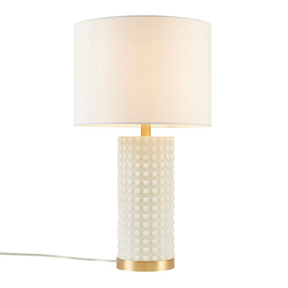 Textured Dot Table Lamp white glass gold base drum shade angled view