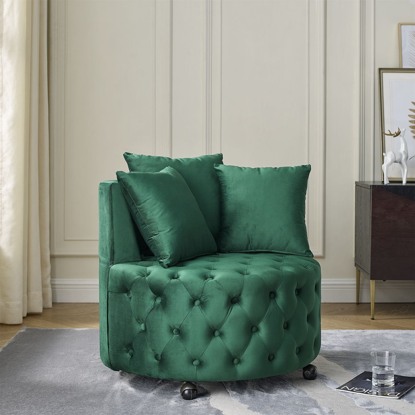Close-up of button tufted velvet upholstery on green swivel chair