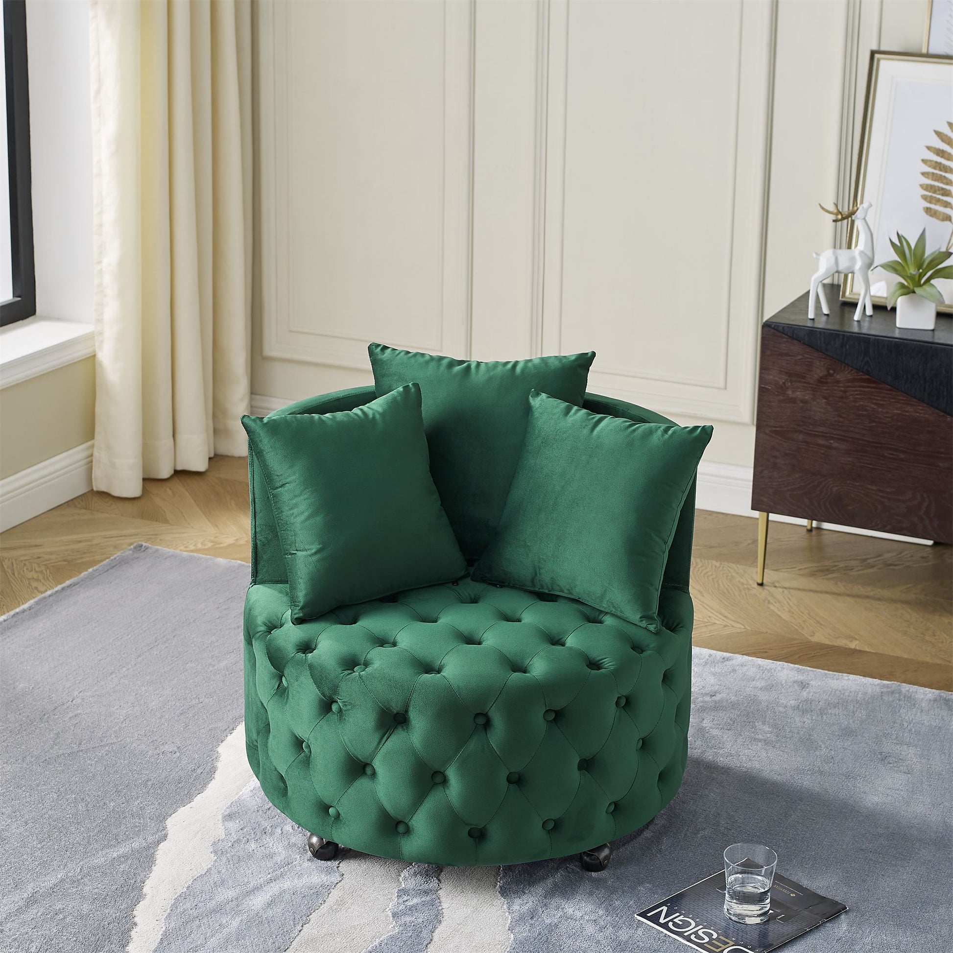 Green velvet swivel chair with tufted back and wheels - side angle