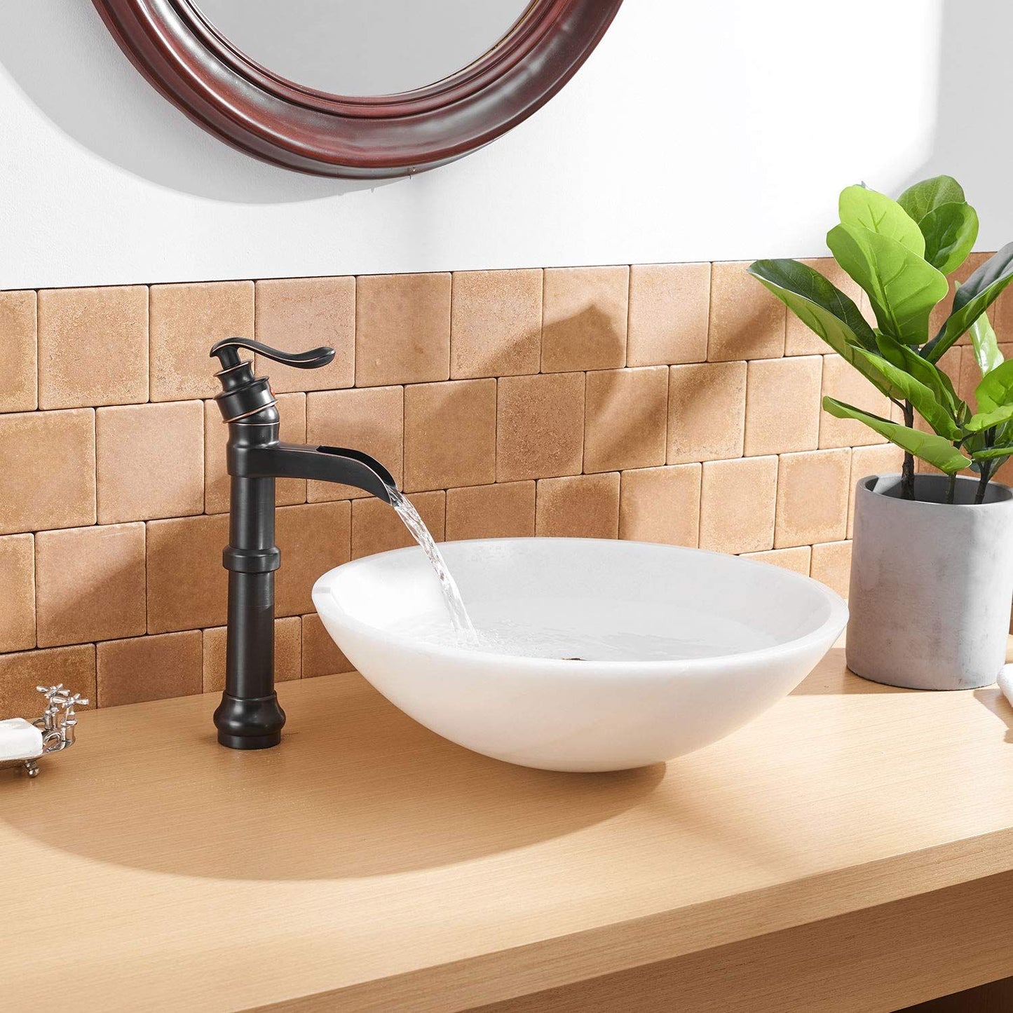 Waterfall Single Hole Single-Handle Vessel Bathroom Faucet With Pop-up Drain in Matte Black And Oil Rubbed Bronze image 9