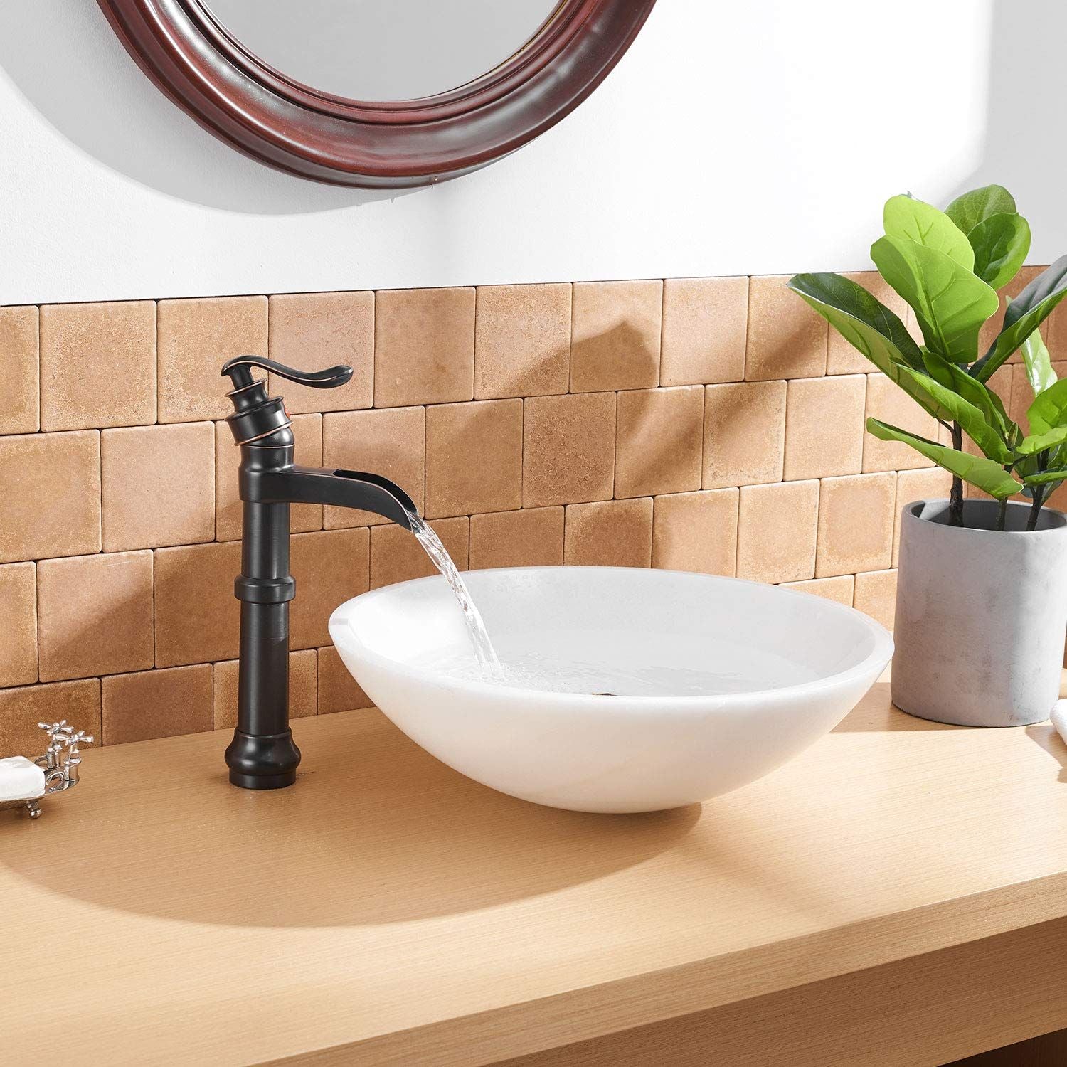 Waterfall Single Hole Single-Handle Vessel Bathroom Faucet With Pop-up Drain in Matte Black And Oil Rubbed Bronze image 9